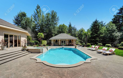 63736989 large swimming pool of american suburban luxury house northwest usa.jpg