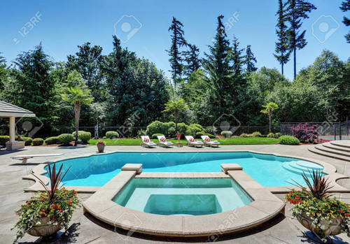 63736987 large swimming pool of american suburban luxury house northwest usa.jpg