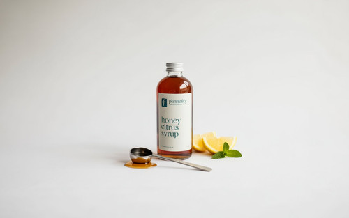 a photograph of a sleek syrup bottle pos rfpHIU28RpKMvQ6n28eGEA lPNO2E6VTIiRg1Oi9paFGw.jpg