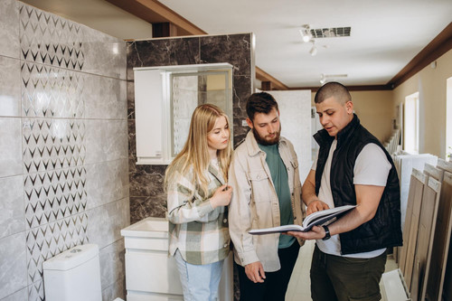 couple looking tiled bathroom they are warehouse that sells interior home bathroom decoration 633611.jpg