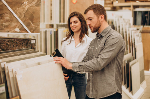 young couple choosing tiles building market 1303 26794.jpg
