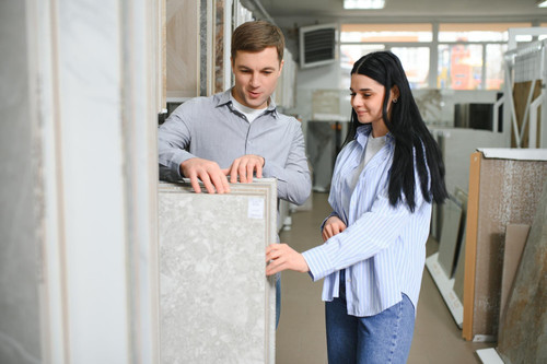 beautiful young couple choosing ceramic tiles their house repairment building shop 255667 65293.jpg