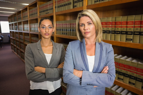 lawyers looking camera law library 13339 80701.jpg
