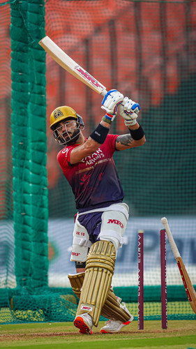 Ahmedabad: Royal Challengers Bengaluru's Virat Kohli bats during a training session on the eve of th.jpg