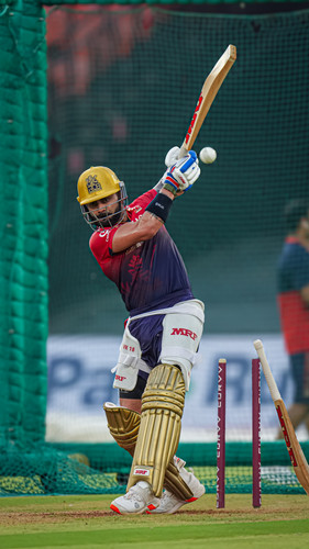 Ahmedabad: Royal Challengers Bengaluru's Virat Kohli bats during a training session on the eve of th.jpg