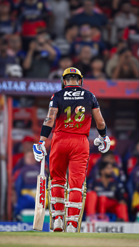 Ahmedabad: Royal Challengers Bengaluru's Virat Kohli walks back to the pavilion after getting dismis.jpg