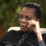 LORD HAVE MERCY by an exasperated older Black woman putting her fingers to her temples (Animated GIF.gif