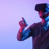man with copy space futuristic device