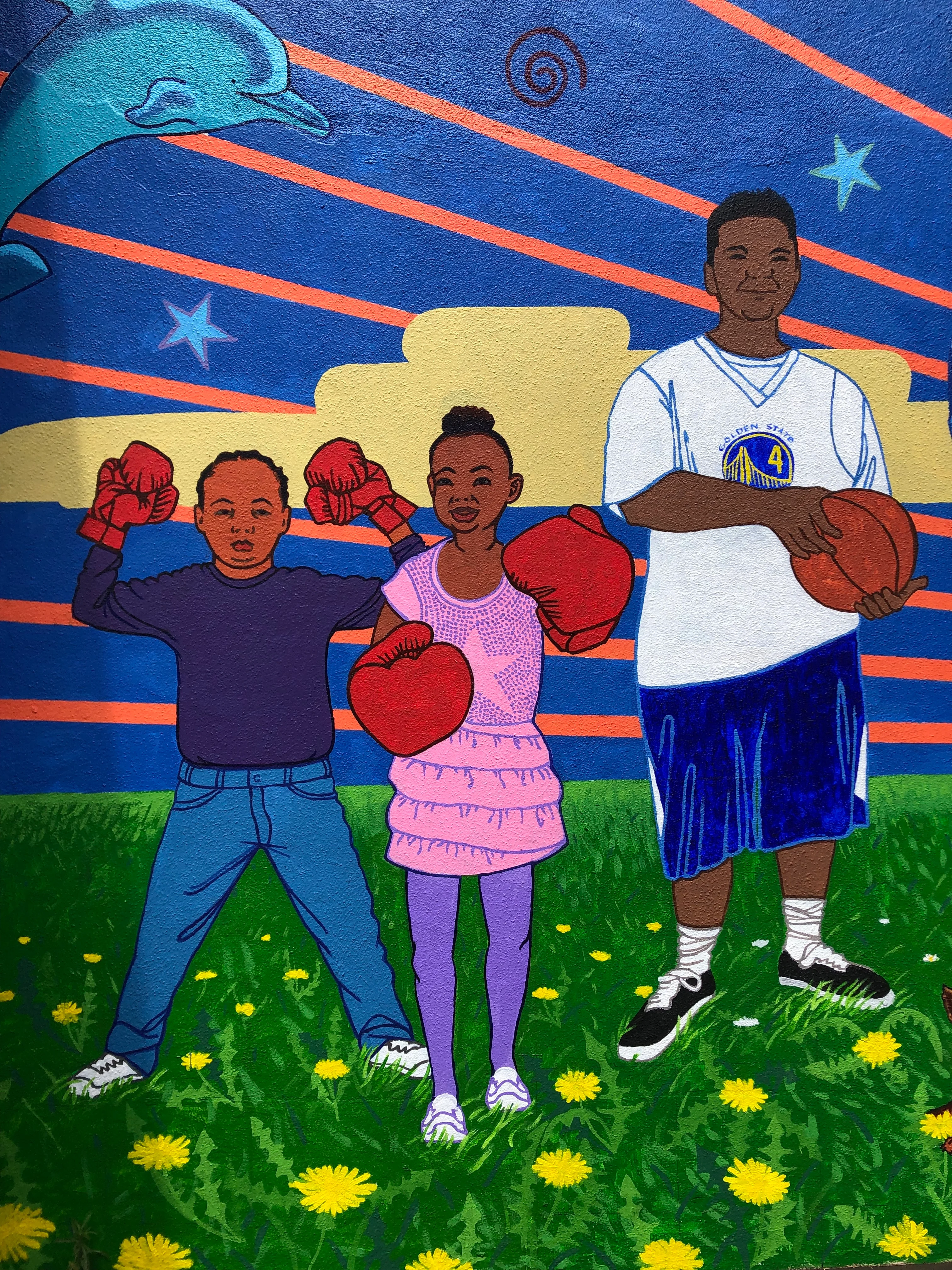 Community mural with diverse families