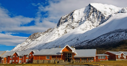 Hosteria del Torres sits in front of a snowy mountain.png