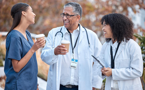 coffee break talking doctors healthcare planning happy conversation outdoor advice from mentor inter.jpg