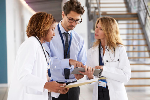 three young male female doctors consulting 625516 3701.jpg