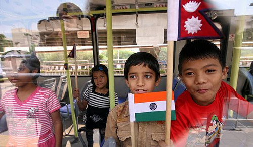 NEW DELHI, INDIA - NOVEMBER 17: School children of Indian & Nepalese origin and NGOs working on Road.jpg