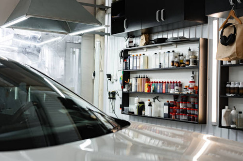 Modern car in a car service close up photo.jpg