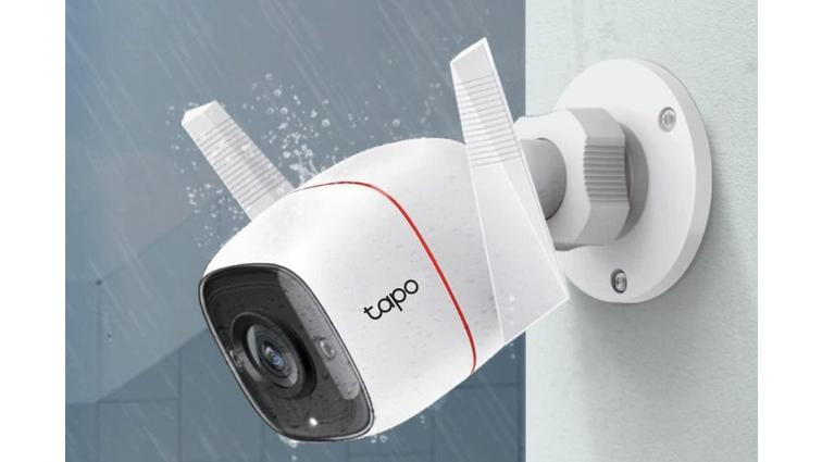 None The Tapo C310 camera mounted on outside trim with graphics of rain falling on it.
