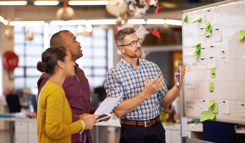 seo team discussing client roi.jpg