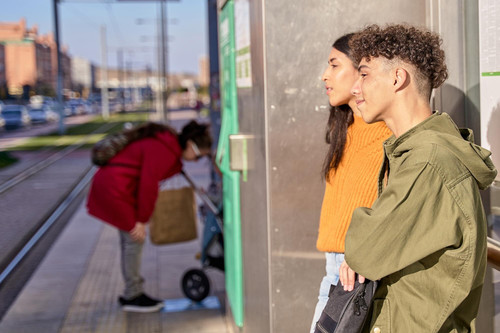 teenage couple waiting train busshuttle bus station concept commuter transport 672594 652.jpg