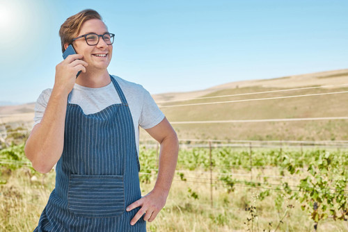 vineyard grape farm farmer phone call with happy smile good new online success countryside agricultu.jpg