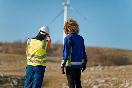 team engineers workers oversees wind turbine project modern wind farm working 597987 9063.jpg