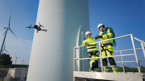 workers inspect wind turbine using drone technology detailed analysis monitoring 35752 16163.jpg