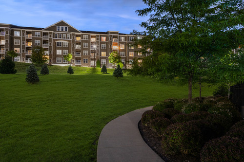 C244190 CityVista Dusk LitWalkway 01 1.jpg