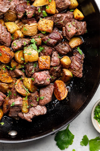 garlic steak bites and potatoes.jpg