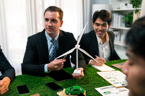diverse group business people planning alternative energy utilization greener sustainable earth by r.jpg