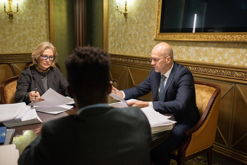 group contemporary lawyers gathered by table paperwork 274679 29822.jpg
