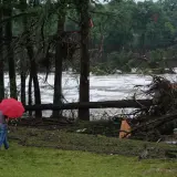 A man surveys damage