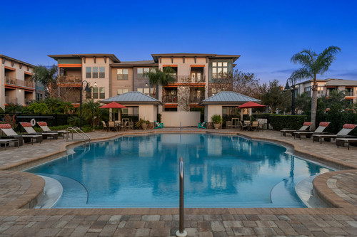 C243890 CrosstownWalk OverlookAtCrosstown TwilightPool1 1.jpg