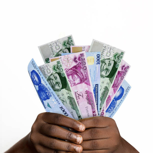 black hands holding new 3d rendered nigerian naira notes closeup of hands holding various.jpg