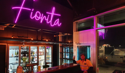 man at fiorita drinking pint.jpg