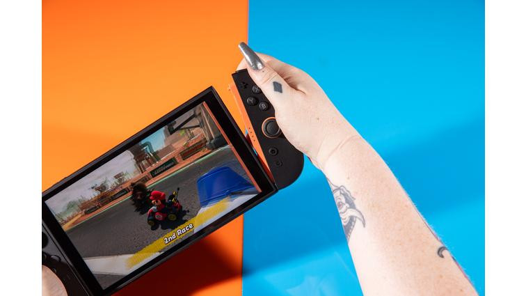 None A photo of Mario Kart World running on a Nintendo Switch 2 in handheld mode.