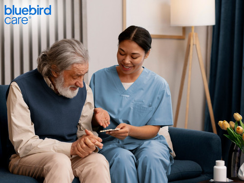 A caring scene where a caregiver and a senior engage outdoors.jpg