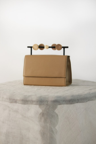 DEVINA JUNEJA CIRCLE HANDLE SATCHEL LF Shop.jpg