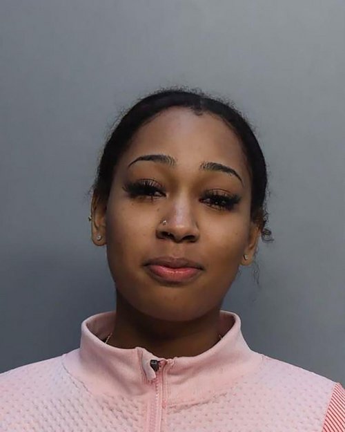 Two-women-arrested-miami-airport-brawl-01-1.jpg
