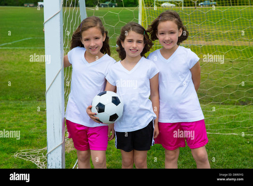 soccer football kid girls team at sports outdoor fileld before match D8R0YG.jpg
