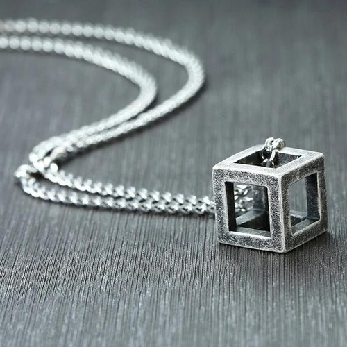 Worn Oxidized Metal Cube Pendant.jpg