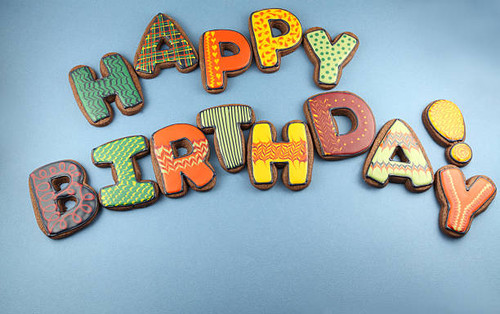 Happy birthday message made with frosted cookies. Lots of copy space..jpg