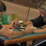 Praying at restaurant