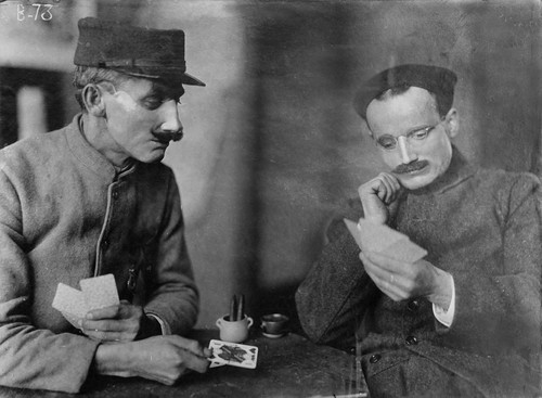 Wounded French soldiers wearing tin masks created by Mrs. Anna Coleman Ladd were photographed at the.jpg