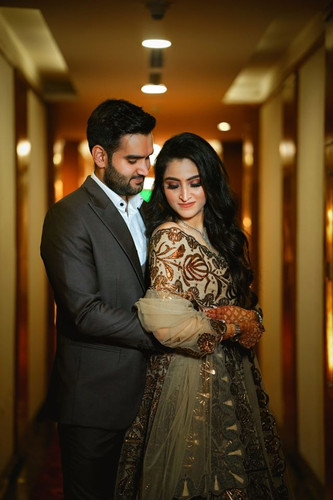 couple stand next to each other.jpg