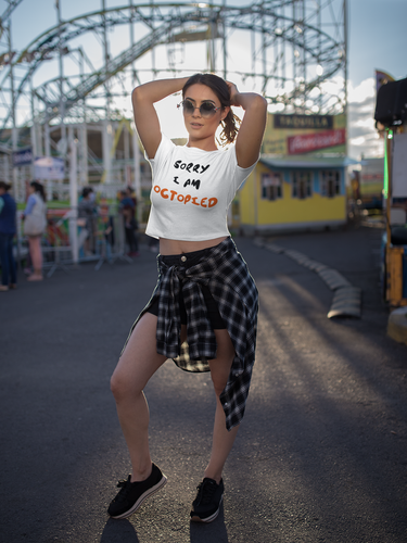 beautiful woman posing at an amusement park wearing a t shirt mockup a19426.png