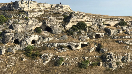 The Sassi originate from a prehistoric troglodyte settlement dating back to 7000 BC.jpg