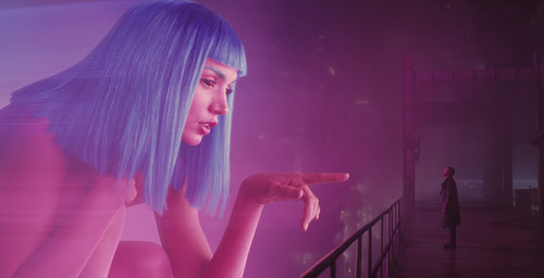 A Joi hologram advertisement interacts with K in Blade Runner 2049 feature