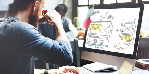 A web developer working on designing a website.jpg