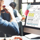 A web developer working on designing a website