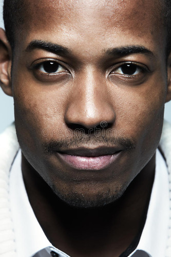 african american black man face over grey background 89746074.jpg