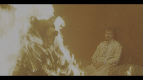 christianbearsuitburningface2160phdr.png