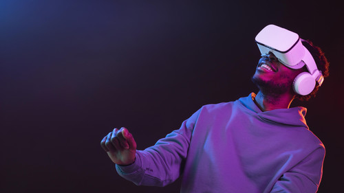 portrait young african american man with vr glasses.jpg